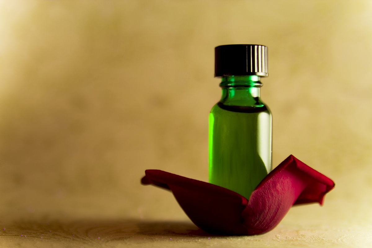 green-essential-oil-bottle-petal